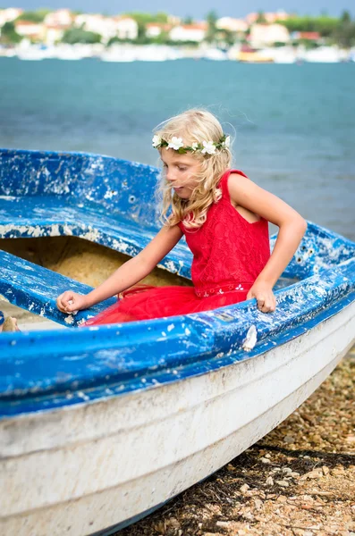 Kid in boot — Stockfoto