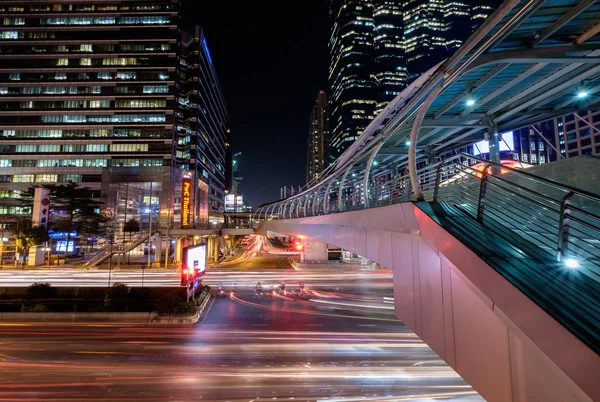 Sky walker at the center connected to electric train station — Stock Photo, Image