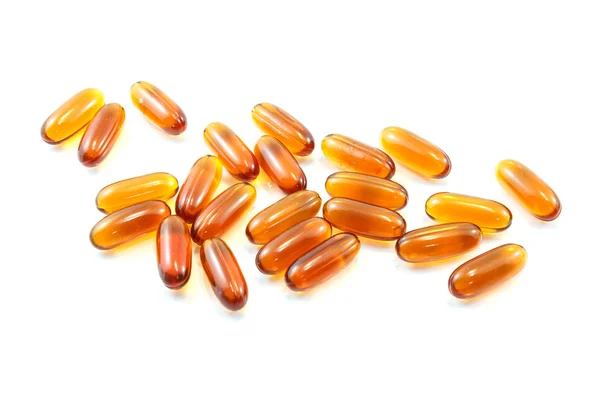 Pillole medicinali o capsule su sfondo bianco — Foto Stock
