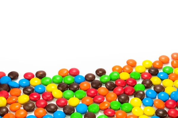 Mucchio di caramelle colorate al cioccolato — Foto Stock
