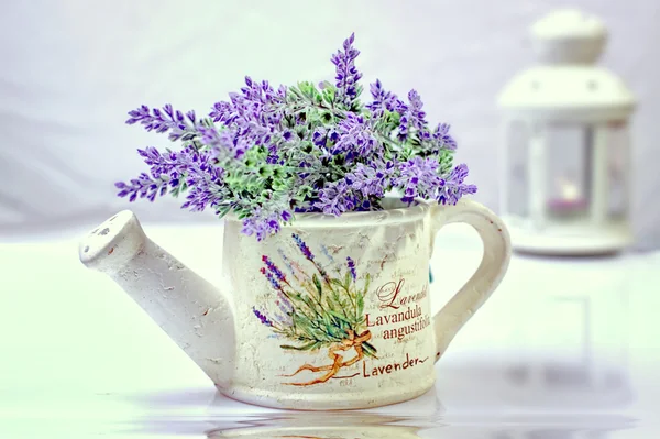 Lavender in watering can — Stock Photo, Image