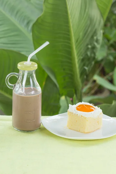 Cake with Orange jam and Chocolate milk — Stock Photo, Image