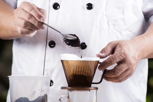 Putting grind cofffe into filter cup — Stock Photo, Image