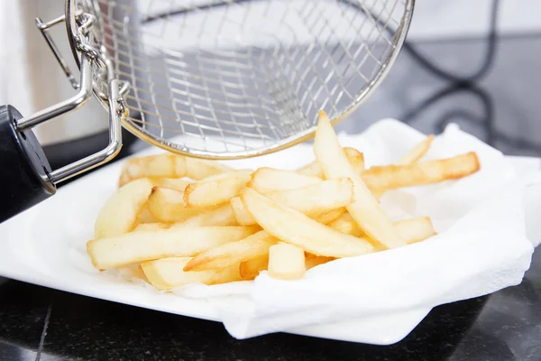 French Fried putting on the Plate — Stock Photo, Image