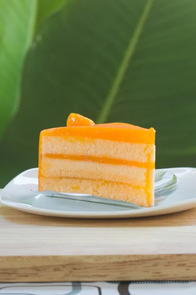 Pedazo de crema de pastel de naranja — Foto de Stock