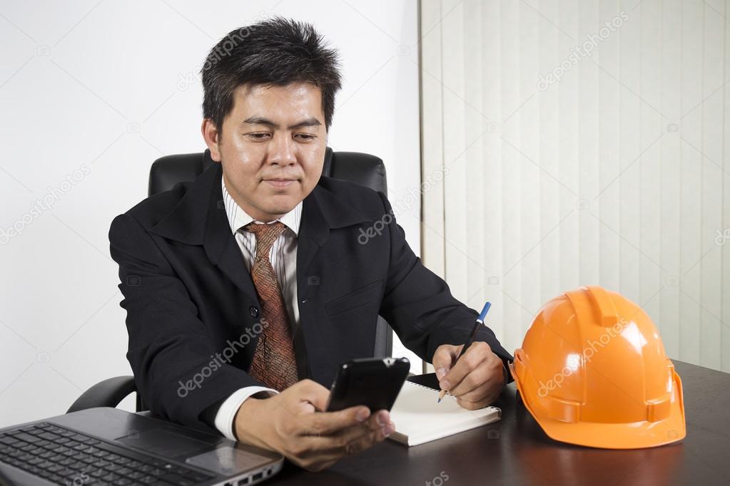 Asian businessman working on the desk 