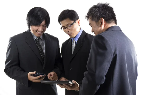 Three Businessman meeting and using mobile phone — Stock Photo, Image