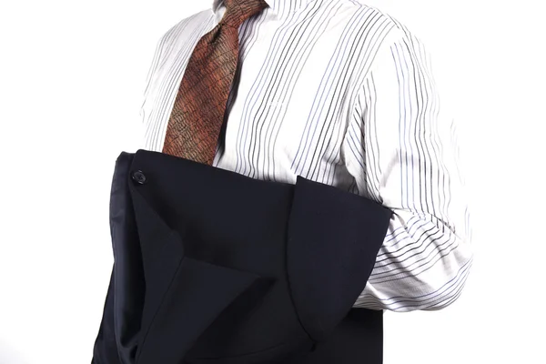 Uomo d'affari tenendo la giacca tuta — Foto Stock