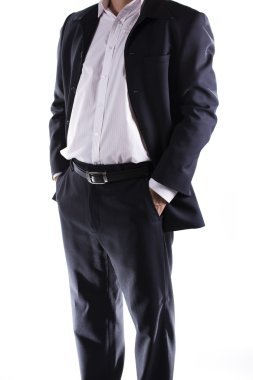 elleri cebinde olan iş adamı