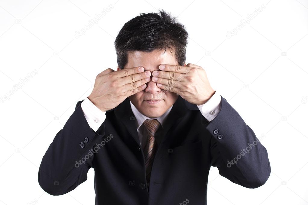 Business man hold hand cover his eyes