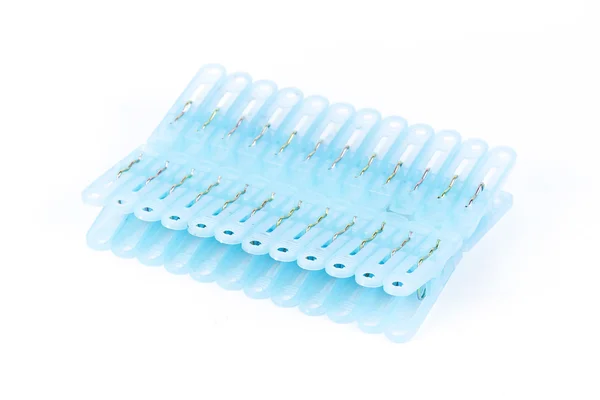 Row of blue clothespeg — Stock Photo, Image