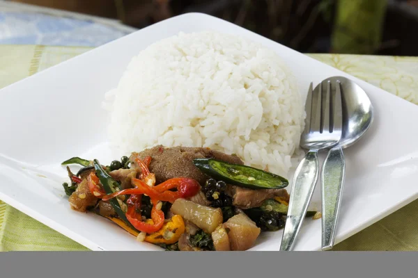 Pad Krapao Kha Moo spicy stir fried pork leg — Stock Photo, Image