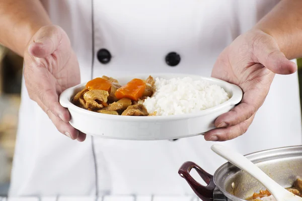 Chef presented Japanese pork curry with steam rice
