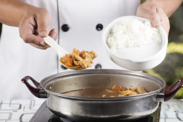 Chef shovel Japanese pork curry with steam rice — Stock Photo, Image