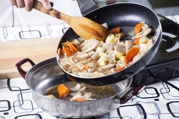 Chef cooking Japanese pork curry