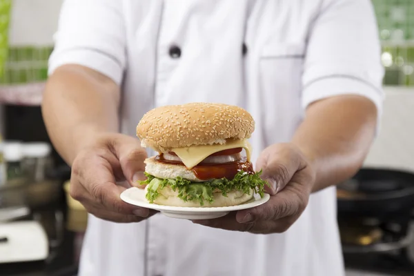 Close up Chef presented Hamburger — Stock Photo, Image