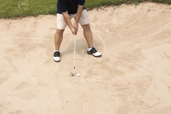 Golfer hit ball on sand trap — Stock Photo, Image