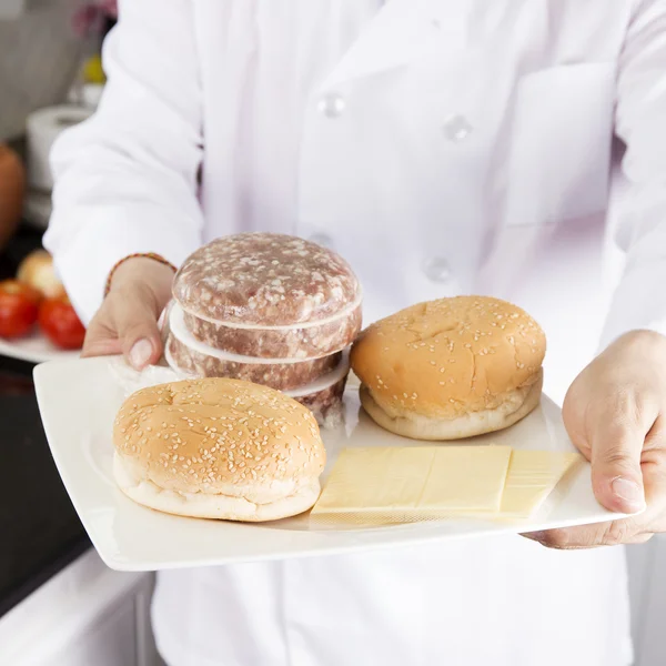 Chef présenté Ingrédients ou hamburger — Photo
