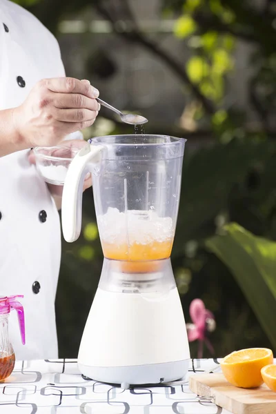 Chef pouring salt — Stock Photo, Image