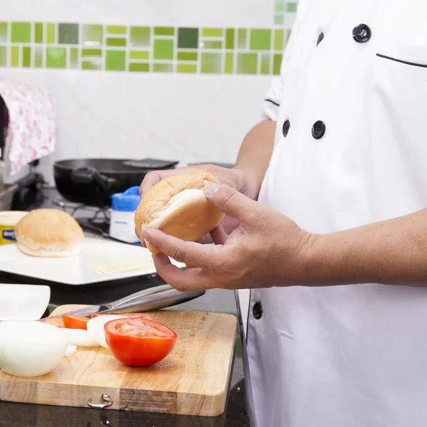 Chef prepare burger bun — Stock Photo, Image
