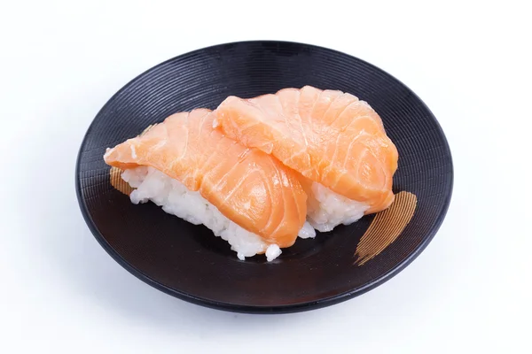 Суши лосось на тарелке — стоковое фото
