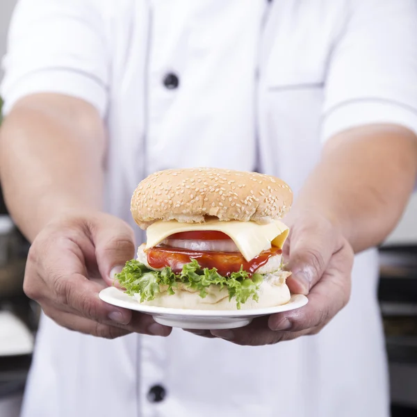 Close up Chef presented Hamburger — Stock Photo, Image