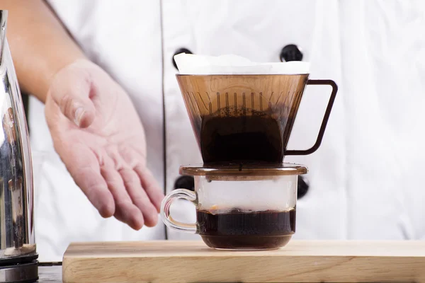 Cup of Dripping fresh hot coffee — Stock Photo, Image