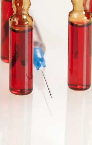 Syringe and ampules — Stock Photo, Image