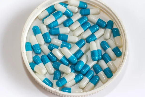 Blauw wit capsule drug geïsoleerd — Stockfoto