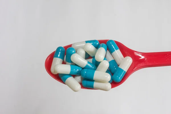 Blauw wit capsule drug geïsoleerd — Stockfoto