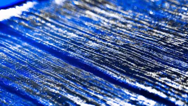 Água Azul Com Glitter — Vídeo de Stock