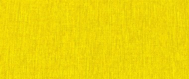 Arkaplan olarak sarı kumaş dokusu