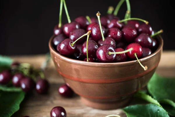 Ripe sweet cherry. Berries close up. Country style. Farm fruits and berries.Ripe cherries from the garden.