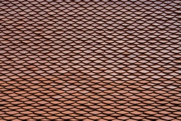 Red tiles roof background