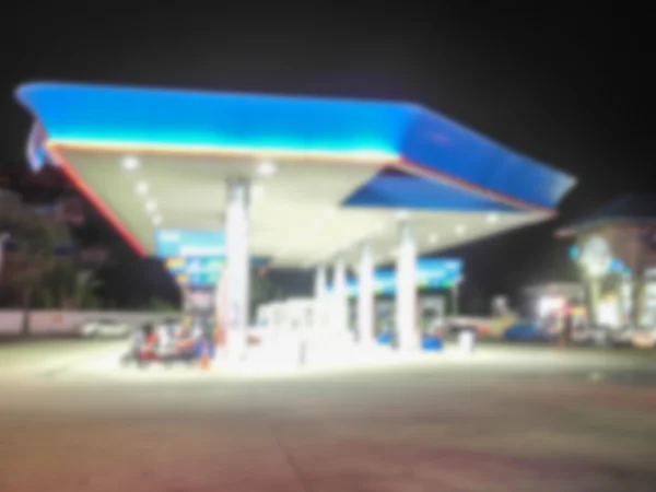 Imagen borrosa de la gasolinera por la noche —  Fotos de Stock