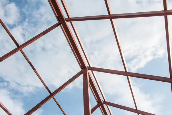 Roof construction with blue sky — Stock Photo, Image