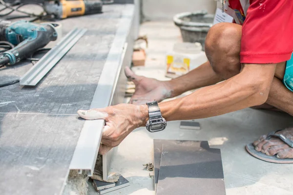 Laying Ceramic Wood Tiles Floor Installing Tiles Construction Site — Stock Photo, Image