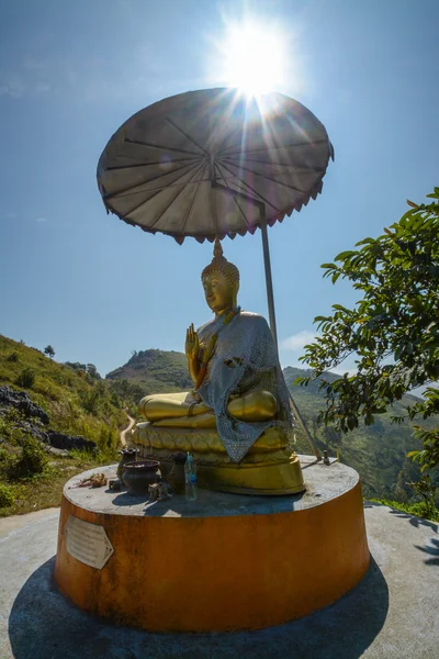 Buddha statue, with sunrise on Pha Tung Mountain , Chiang Rai , Thailand — Stock Photo, Image