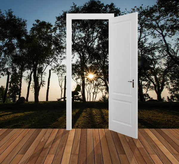 Landscape behind the opening door — Stock Photo, Image