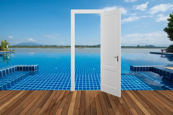 Landscape behind the opening door — Stock Photo, Image