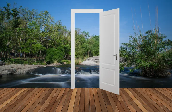 Landscape behind the opening door,3D — Stock Photo, Image