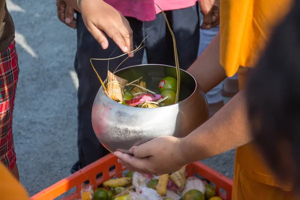 Buddhist monks are given food offering from people for End of Buddhist Lent Day — Stock Photo, Image