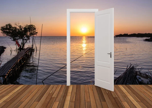 Landscape behind the opening door — Stock Photo, Image