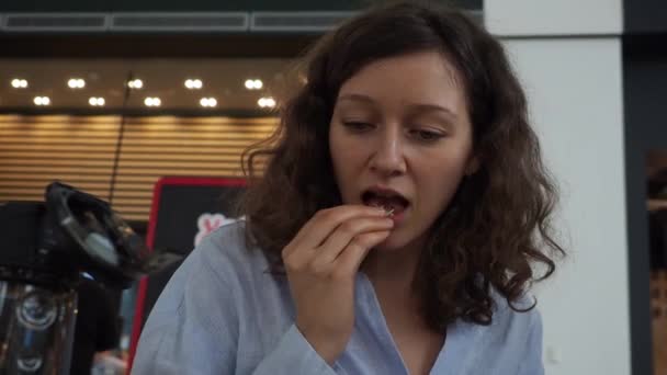 Young woman taking vitamins, medicine pills and drinking water. Close up — Stock Video