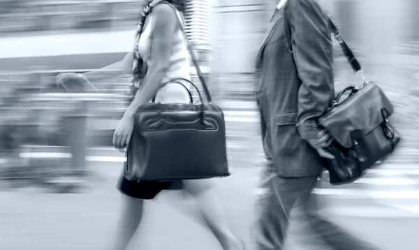 Group of business people in the street in blue tonality — Stock Photo, Image