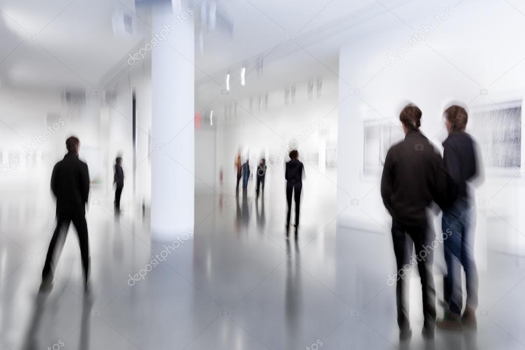 people in the art gallery center