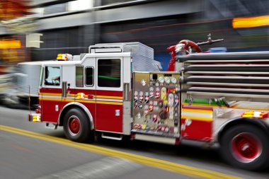 fire trucks and firefighters brigade in the city clipart