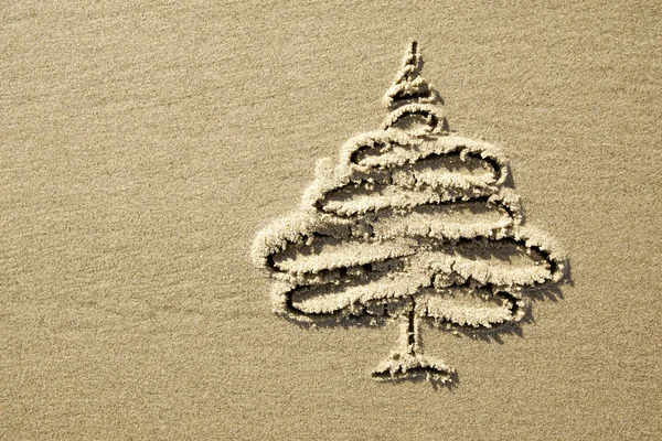 Images christmas tree in the sand — Stock Photo, Image