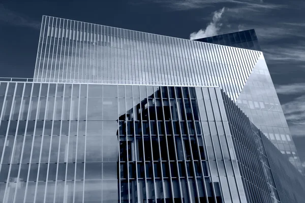 Modern geometric abstraction glass windows of a skyscraper — Stock Photo, Image