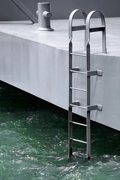 Metal ladder in dock to exit from the swimming pool — Stock Photo, Image